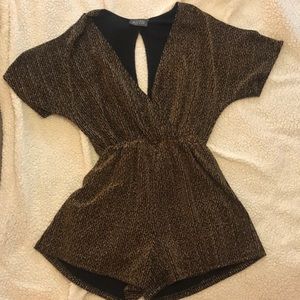 ASTR black and gold detailed romper size small